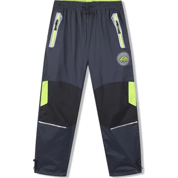 Chlapecké kalhoty Chlapecké šusťákové kalhoty - KUGO SK7751, tmavě šedá / signální zipy Barva: Šedá, Velikost: 122