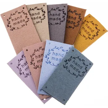 Štítek, nášivka- Hand made - umělá kůže 50 x 25 mm (lístečky)