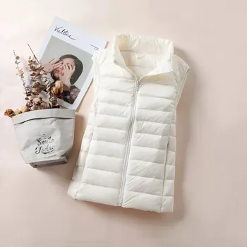 Dámská vesta Prošívaná vesta s peřím Barva: Bílá, Velikost: S