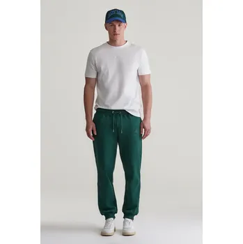TEPLÁKY GANT REG TONAL SHIELD SWEATPANTS TARTAN GREEN