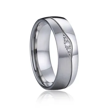 Prsten Nubis NSS1013 dámský snubní prsten se zirkony