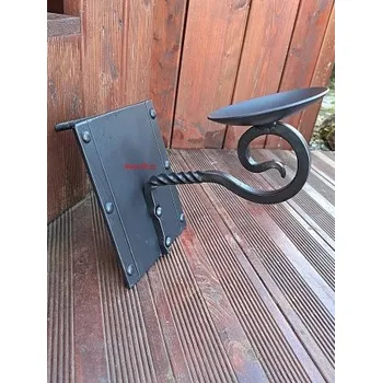 Svícen Kovaný svícen na zeď Plocháč