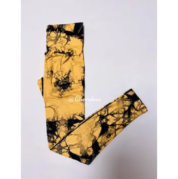 Dámské legíny Dámské legíny s abstraktním vzorem Barva: Zlatá, Velikost: M