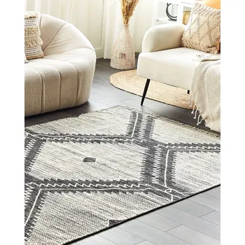 Koberec Koberec černý a bílý bavlna vlna 140 x 200 cm geometrický vzor střapce orientální boho styl Beliani