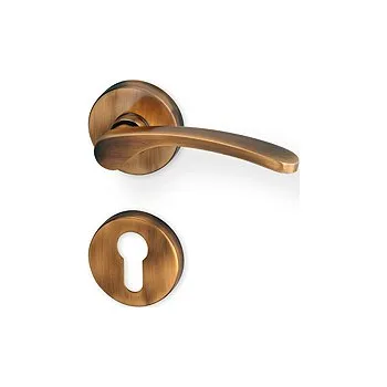 Dveřní kování AC-T SERVIS Dveřní klika JANA bronz - kulatá rozeta Provedení kliky: vč. rozety PZ - fabkový klíč, Mechanizmus rozety: Plastová konstrukce