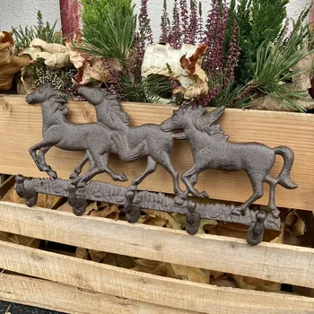 Věšák Litinový věšák KONĚ