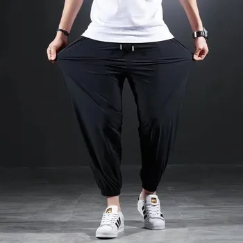 Pánské kalhoty Pánské kalhoty s gumičkami na nohavicích Barva: Černá, Velikost: 5XL