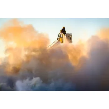 Plakát Plakát, Obraz - Firefighter fighting fire, Johner Images