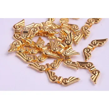 Korálek Kov 565 (21x7 mm)