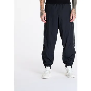 Pánské kalhoty Kalhoty Nike Solo Swoosh Men's Track Pant Black/ White XXL