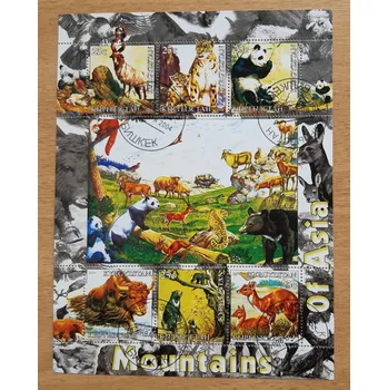 Poštovní známka Kyrgyzstán aršík raz., fauna asijských hor r. 2004