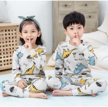 Čína Dětská dlouhá veselá pyžámka Motiv: dinosauři, bílá, Velikost: 7T