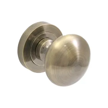 Dveřní kování DOMINO Koule 2075-R M3 (bronz), komplet na obě strany - pohyblivá, rozeta 950 PZ