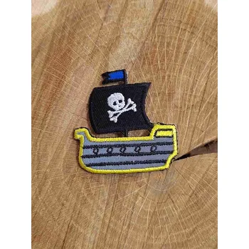Textilní nažehlovací páska Nažehlovačka reflexní pirátská loď