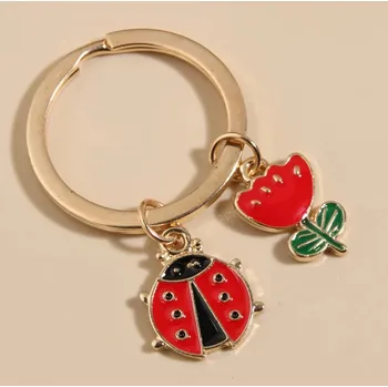 Přívěsek na klíče beruška a květina