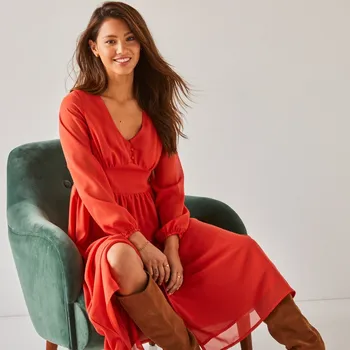 Dámské šaty Jednobarevné rozšířené šaty pro malou postavu oranžová 54