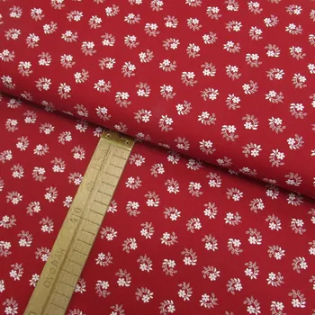 Bavlněné plátno - Květy a listy bílé na červené - šíře 150cm