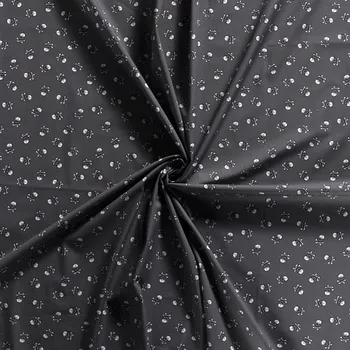 Bavlněné plátno bílé lebky na šedé