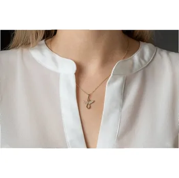 Přívěsek Větší zlatý andělský přívěsek Agnes II s brilianty Materiál šperku: Žluté zlato