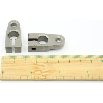 Příslušenství k šicímu stroji Svěr. rameno