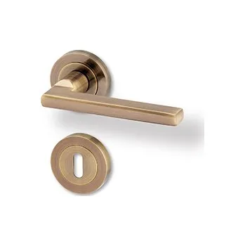 Dveřní kování AC-T SERVIS Dveřní klika LEIPZIG bronz - kulatá rozeta Provedení kliky: vč. rozety BB - obyčejný klíč, Mechanizmus rozety: Kovová konstrukce