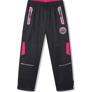 Dívčí kalhoty Dívčí šusťákové kalhoty - KUGO SK7751, černá / růžové zipy Barva: Černá, Velikost: 122