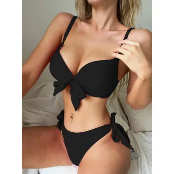 Dámské plavky Dámské jednobarevné plavky s mašličkami v dekoltu a na bocích (mix barev) Barva: Černá, Velikost: L