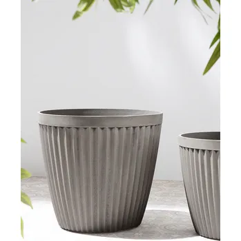 Květináč Sada 2 květináčů taupe kamenná směs a polyresin kulaté ⌀ 44 cm interiér exteriér do každého počasí elegantní moderní styl Beliani