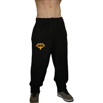 Tepláky Superhuman - černá/žlutá Černá M