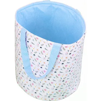 Dětská postýlka Eva Kiedroňová Látkový košík s oušky - Jarní louka s modrými tečkami