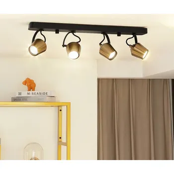 Lampička Stropní bodové svítidlo Lindby Sylveria, 4 světla, černá/zlatá, železo - Stropní držák - délka 60 cm, šířka 13 cm; výška stínidla 8,3 cm černá, zlatá 4 x 10 W LED - Doprava zdarma