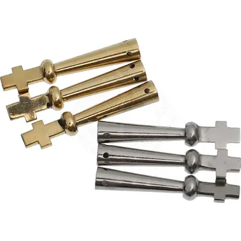 Karnevalový doplněk Brass Buckles 1ks nákončí na tkanice s křížovým koncem - Outlet