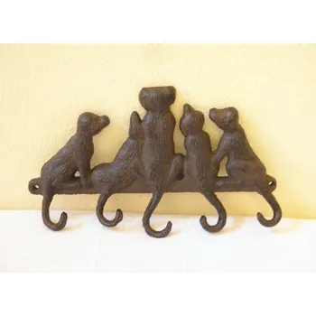 Věšák FIGURÁLNÍ KOVOVÝ VĚŠÁK NA ZEĎ - PEJSCI