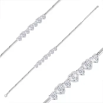 Náramek Rhodiovaný náramek ze stříbra 925, čirá zirkonová srdíčka, zirkonové kontury srdcí