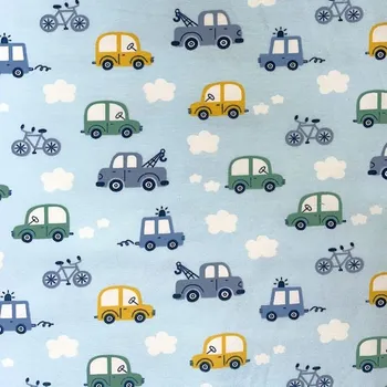 Bavlněný úplet sv.modrý auta š. 160 cm EU