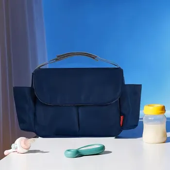 Přebalovací taška Univerzální organizér / přebalovací taška na kočárek (36x17x11,5 cm) Barva: tmavě modrá