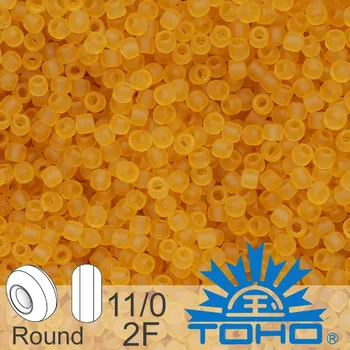 Korálek Korálky TOHO tvar ROUND (kulaté). Velikost 11/0. Barva č. 2F-Transparent-Frosted Lt Topaz . Balení 8g.