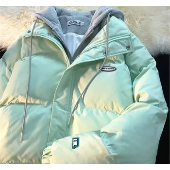 Dámská bunda Dámská zimní bunda s všitou mikinovou podšívkou s kapucí Barva: zelená, Velikost: XL