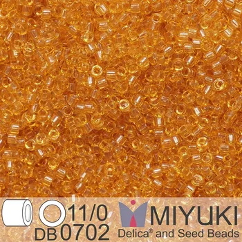 Korálek Korálky Miyuki Delica 11/0. Barva Tr Lt Topaz DB0702. Balení 5g.