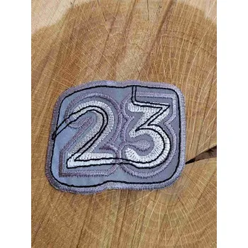 Textilní nažehlovací páska Nažehlovačka reflexní číslo 23