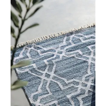 Koberec Koberec modrý jutový 140 x 200 cm se vzorem čtyřlístku ručně tkaný se střapci orientální marocký vzor Beliani