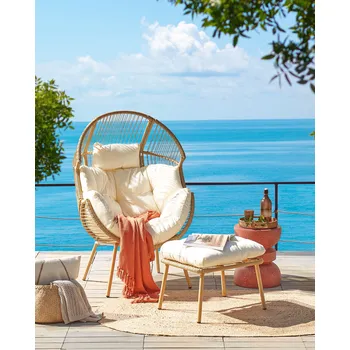 Zahradní křeslo přírodní umělý ratan s podnožkou bílý bavlněný podsedák moderní boho styl do interiéru i exteriéru Beliani
