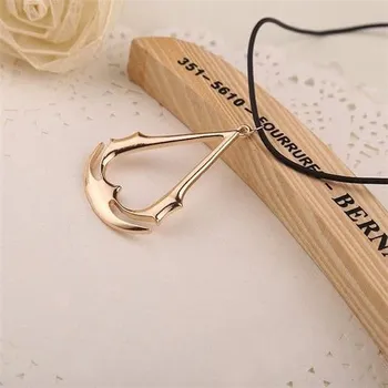 Počítačová hra náhrdelník Assassins Creed Logo zlatá