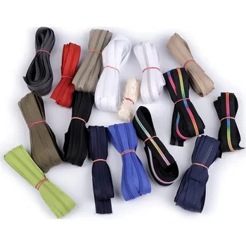 Zbytková metráž zipů, barva mix náhodný