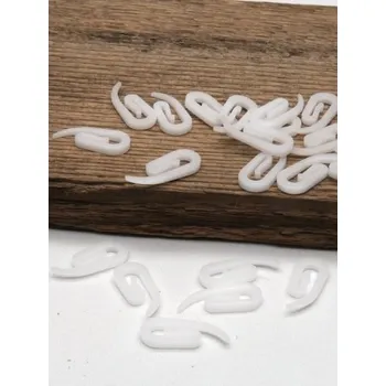 Uchycení záclony a závěsu Háček záclonový 28 mm spirála