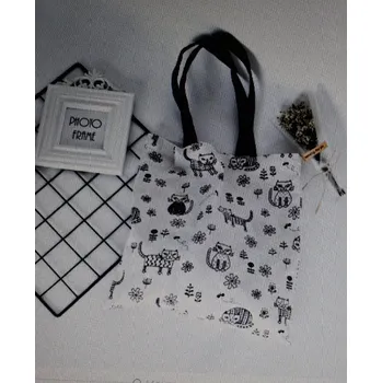 Taška režné barvy s malými kočkami