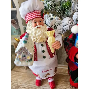 Vánoční dekorace Vánoční dekorace taťka Santa Claus cukrář s perníkovou chaloupkou - 16*8*28 cm