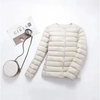 Dámská softshellová bunda Dámská prošívaná péřová bunda na přechodné období Barva: Aprikotová, Velikost: XL