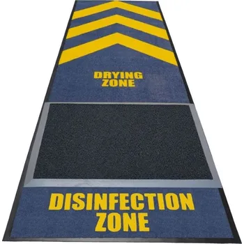 Rohožka Textilní čisticí rohož s prostorem pro umístění rohože s dezinfekčním roztokem a dosušovací zónou.