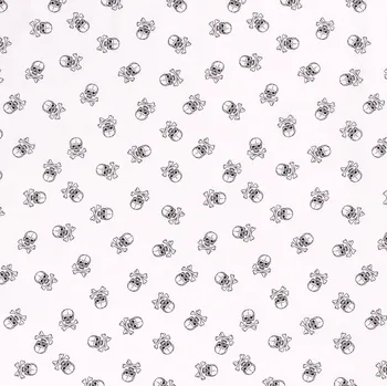Bavlněné plátno černé lebky na bílé